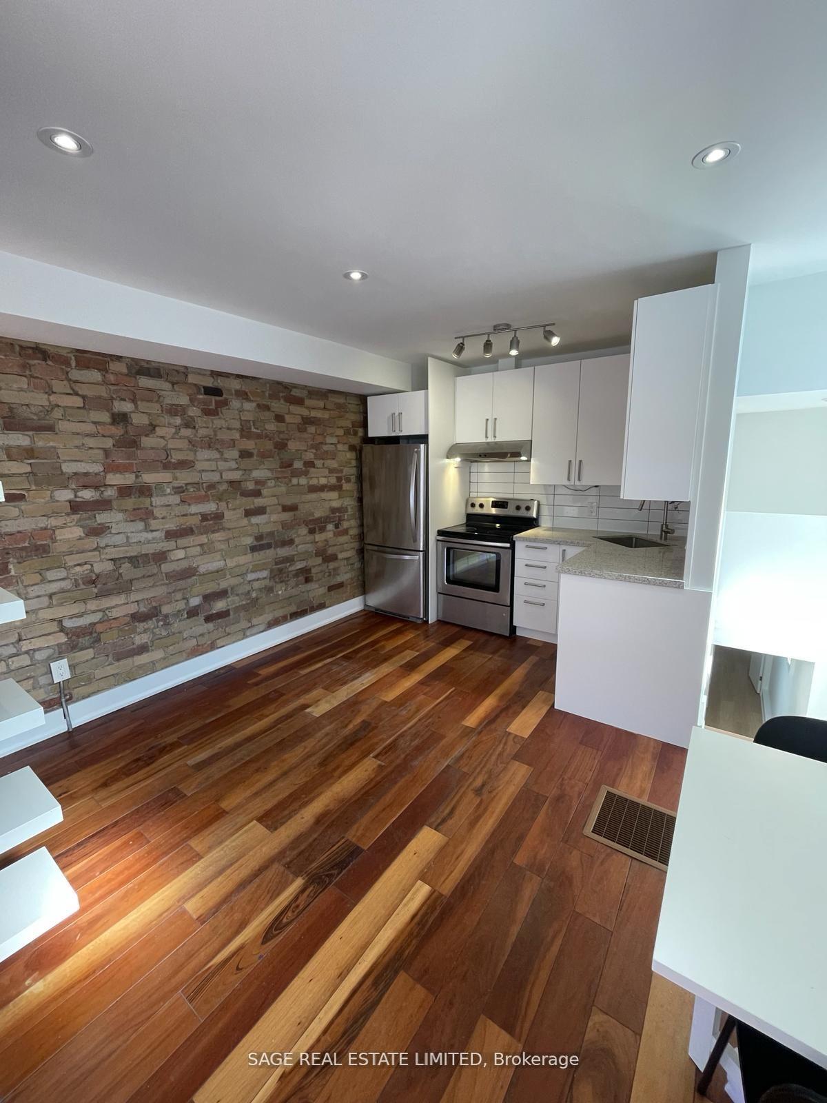 Photo 5 of Unit 1, 52 Delaney Crescent, Toronto, Little Portugal — HOMEH