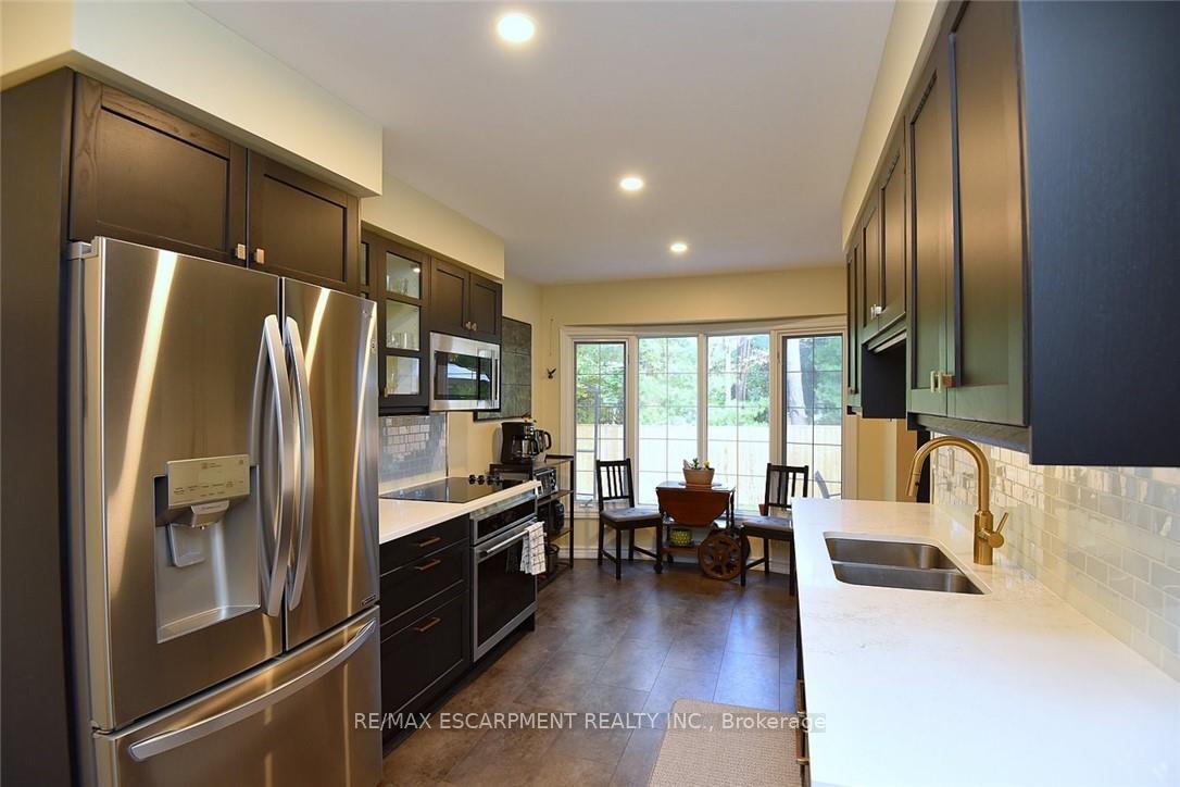 Photo 3 of Unit 59, 175 Fiddlers Green Road, Hamilton, Ancaster — HOMEH