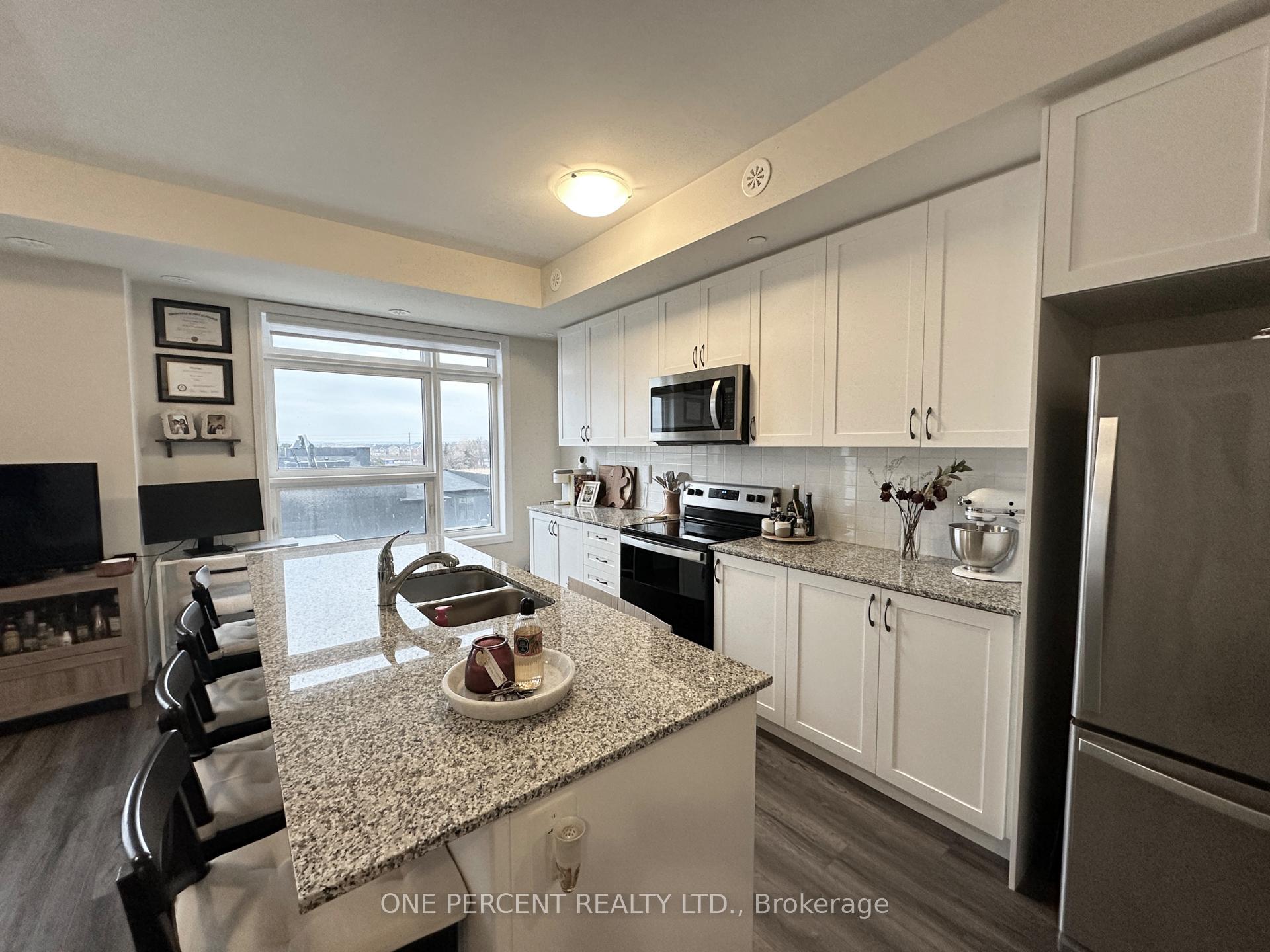 Photo 5 of Unit 104, 1589 Rose Way, Milton, Cobban — HOMEH