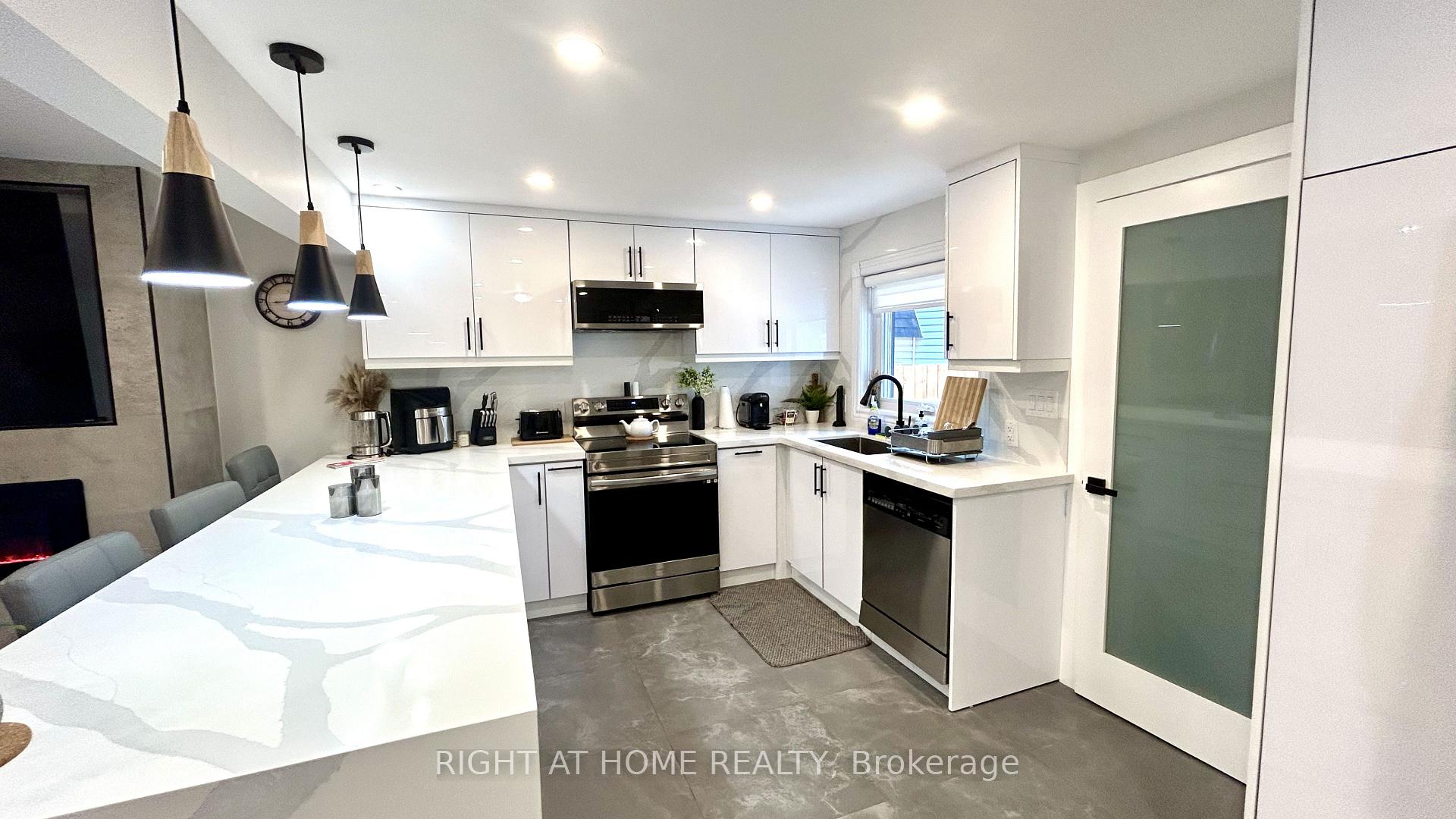 Photo 5 of 502 River Road E, Wasaga Beach — HOMEH