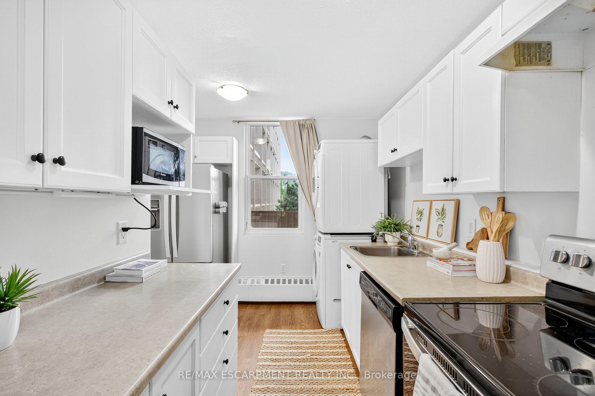 Photo 13 of Unit 320, 350 Quigley Road, Hamilton, Vincent — HOMEH