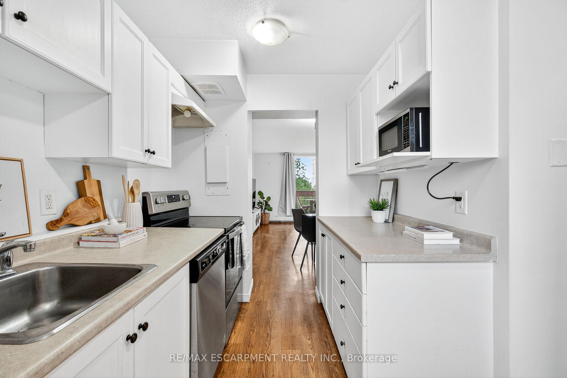 Photo 3 of Unit 320, 350 Quigley Road, Hamilton, Vincent — HOMEH