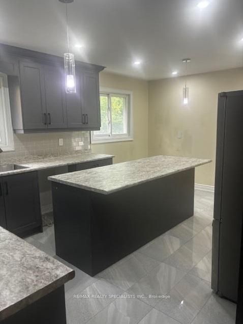 Photo 3 of Unit Upper, 20 Roseville Drive, Brampton, Brampton South — HOMEH