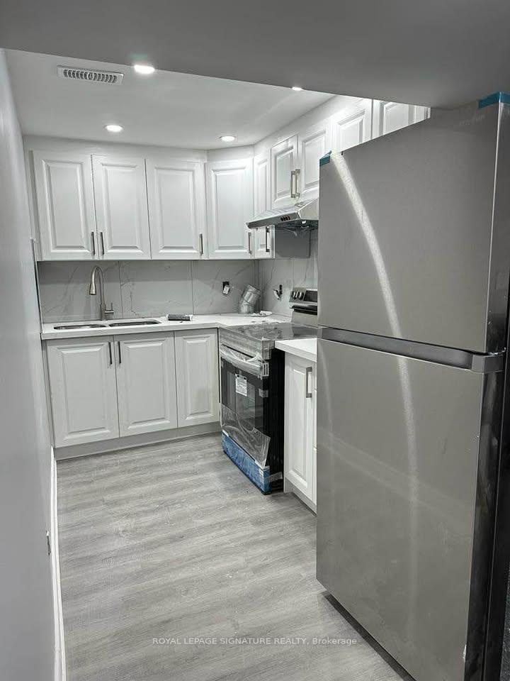 Photo 4 of Unit Lower, 31 Norbert Road, Brampton, Brampton South — HOMEH