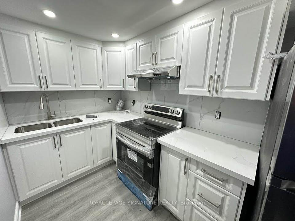 Photo 8 of Unit Lower, 31 Norbert Road, Brampton, Brampton South — HOMEH