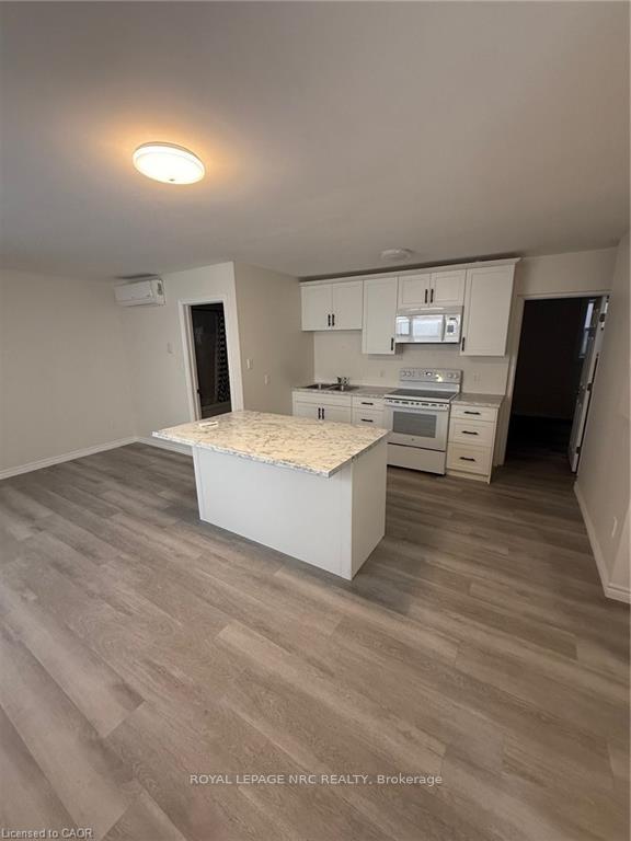 Photo 4 of Unit 4, 72 Hartzel Road, St. Catharines, Secord Woods — HOMEH