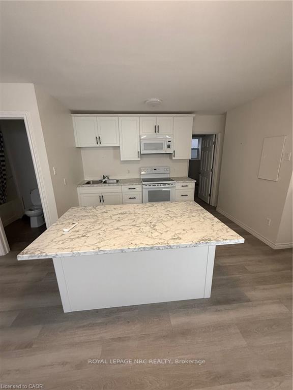 Photo 3 of Unit 4, 72 Hartzel Road, St. Catharines, Secord Woods — HOMEH