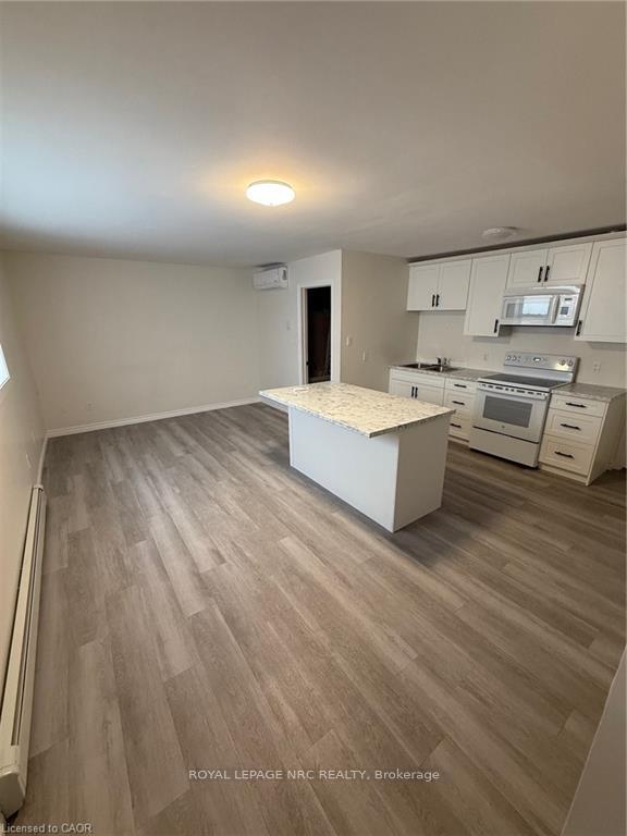 Photo 7 of Unit 4, 72 Hartzel Road, St. Catharines, Secord Woods — HOMEH