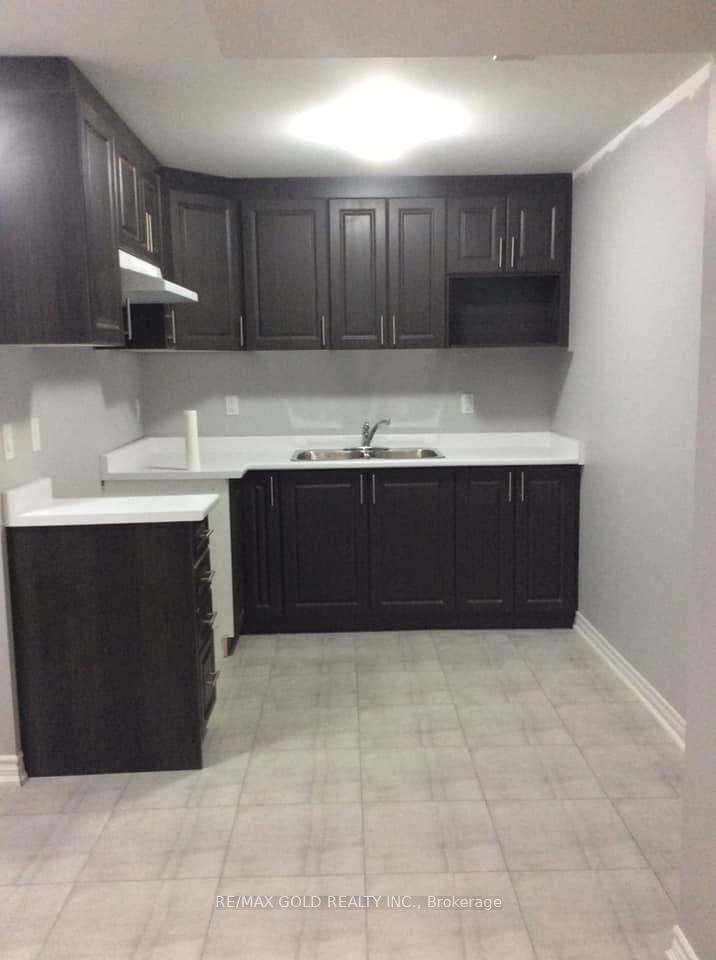 Photo 6 of Unit Basemen, 19 Bluffmeadow Street, Brampton, Bram East — HOMEH