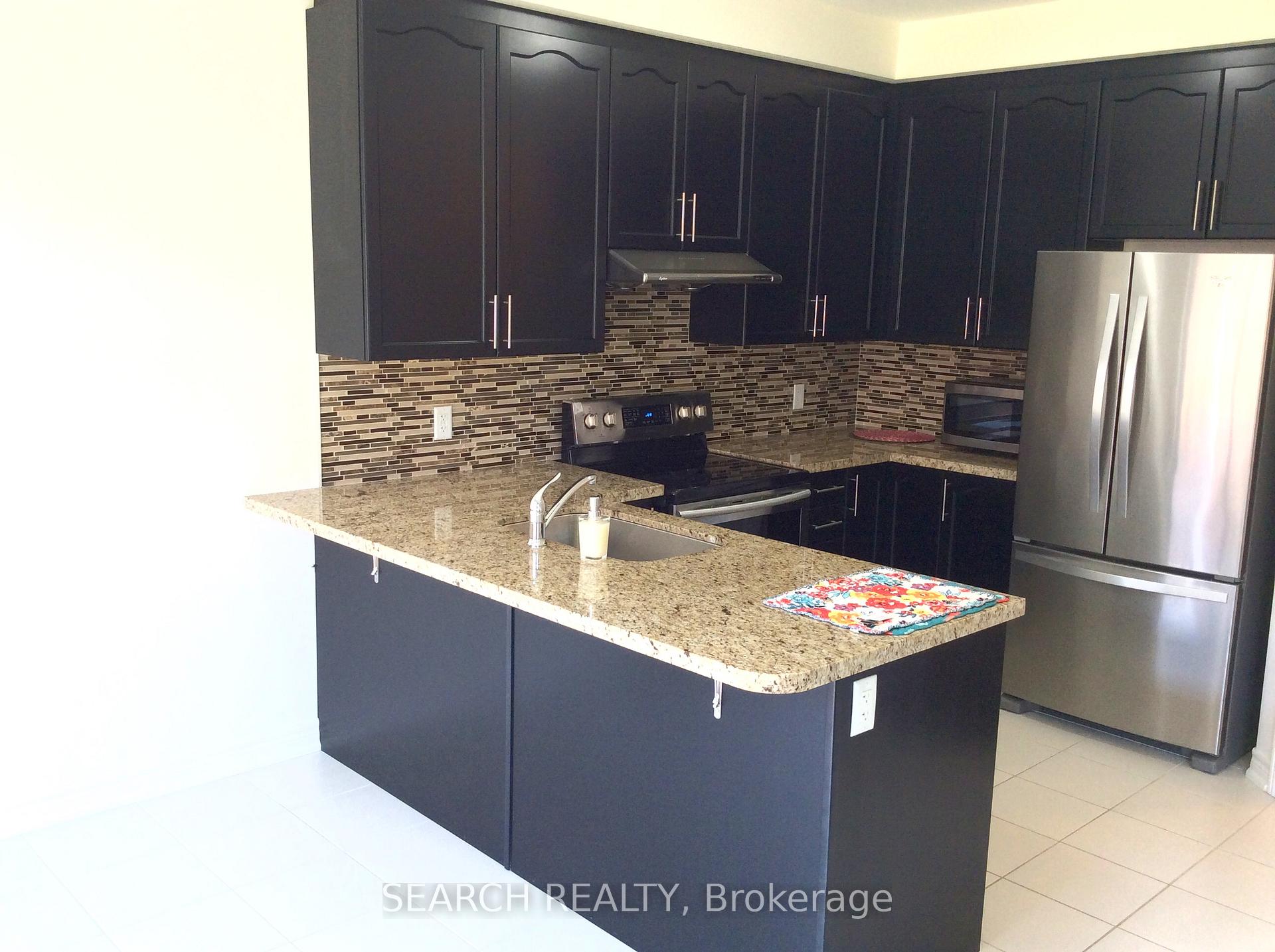 Photo 3 of 9 Exhibition Crescent, Brampton, Northwest Brampton — HOMEH