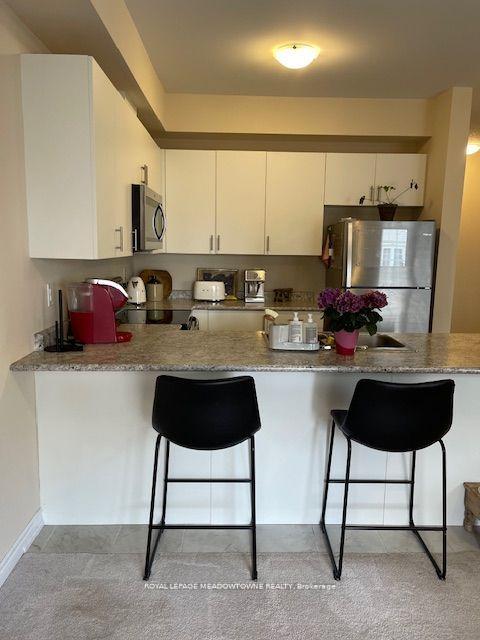 Photo 10 of Unit 28, 88 Decorso Drive, Guelph, Kortright East — HOMEH