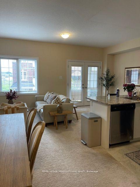 Photo 4 of Unit 28, 88 Decorso Drive, Guelph, Kortright East — HOMEH