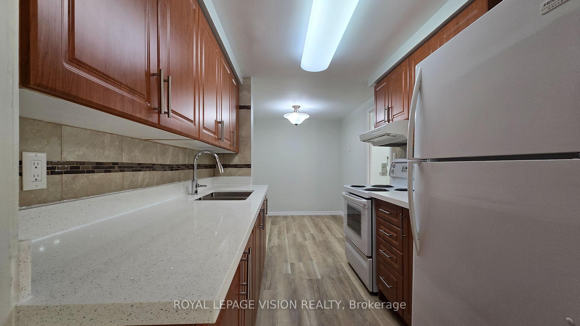 Photo 12 of Unit 406, 6 Crescent Town Road, Toronto, Crescent Town — HOMEH