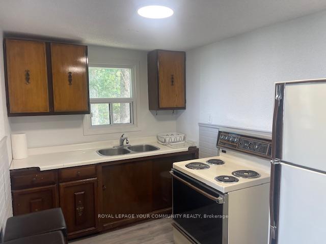 Photo 7 of Unit Unit B, 274 Coastline Drive, Wasaga Beach — HOMEH