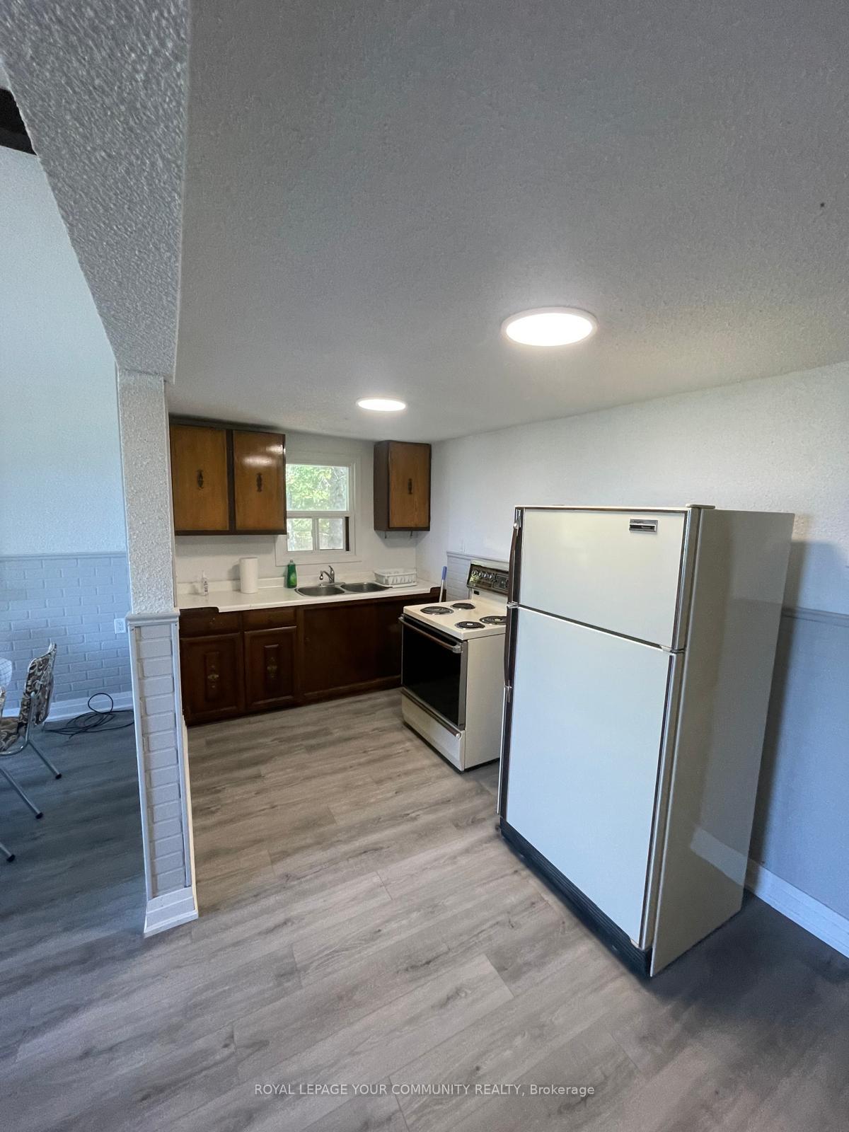 Photo 16 of Unit Unit B, 274 Coastline Drive, Wasaga Beach — HOMEH