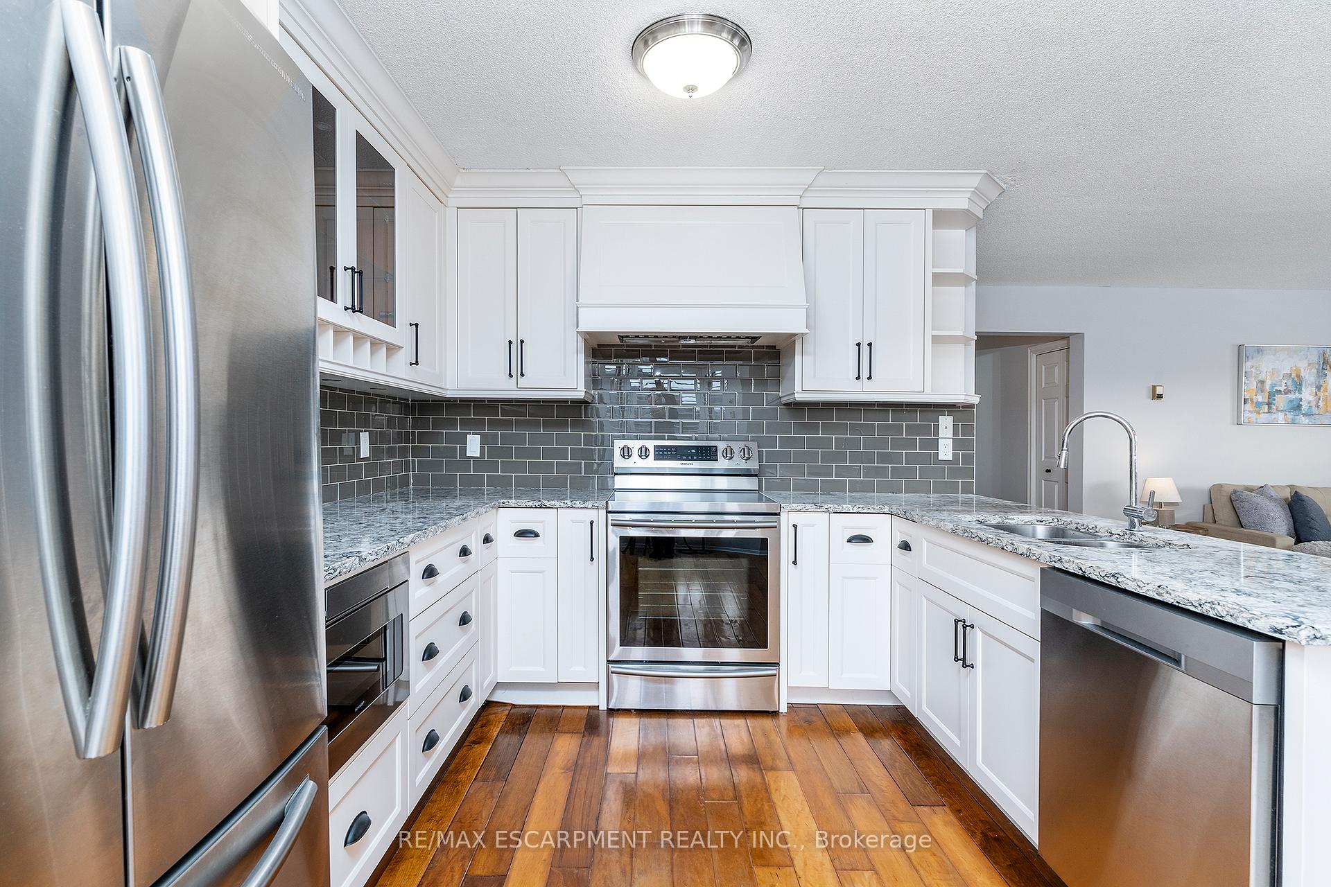 Photo 2 of Unit 404, 240 Quigley Road, Hamilton, Vincent — HOMEH