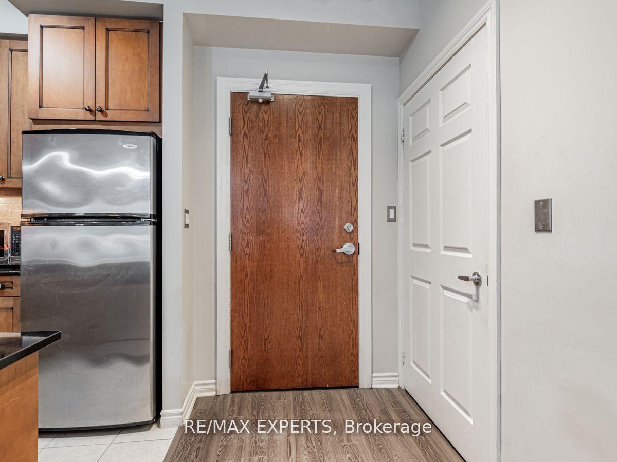 Photo 2 of Unit 107, 4620 Highway 7 Road, Vaughan, East Woodbridge — HOMEH