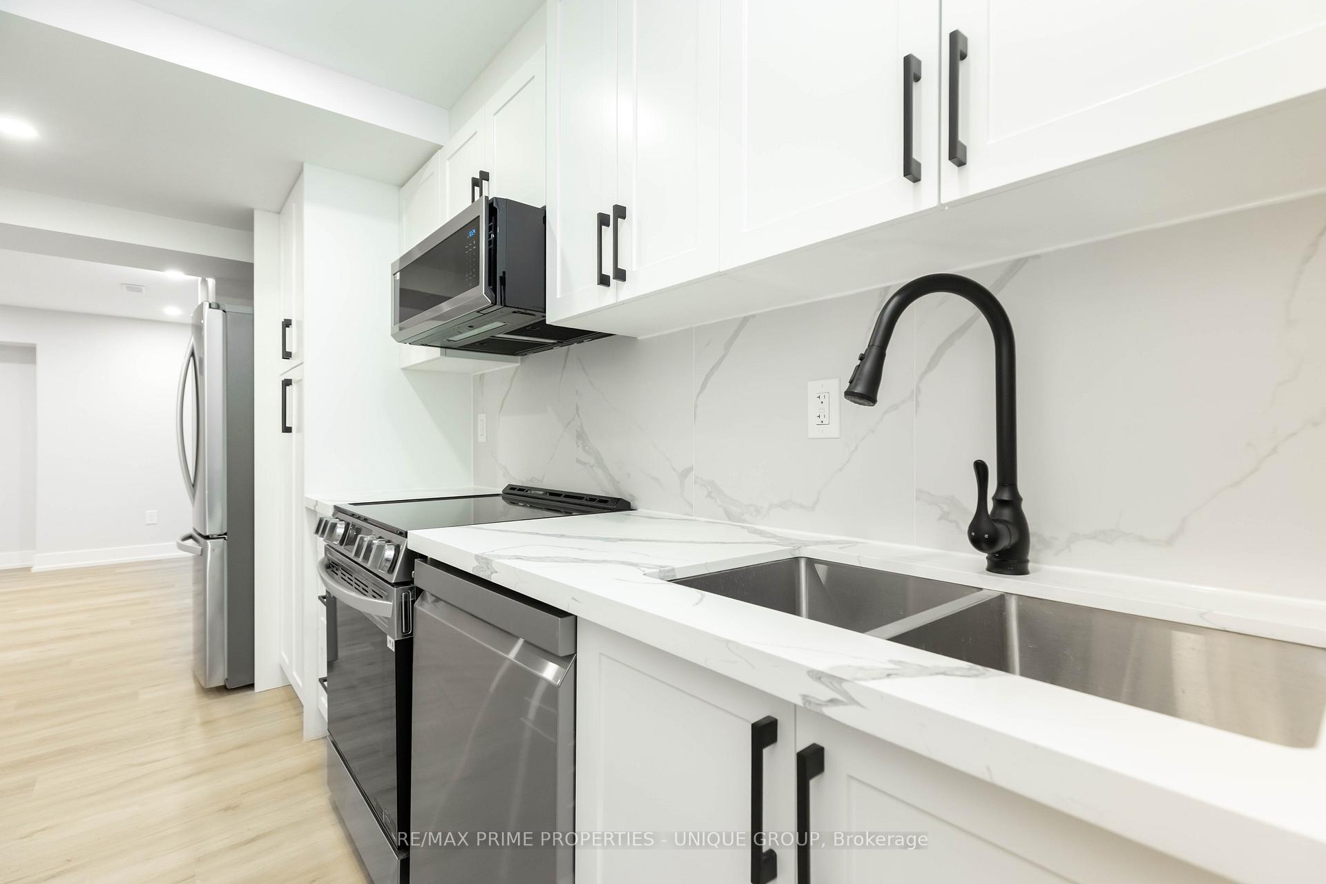 Photo 3 of Unit Lower, 10 Emmett Place E, Whitby, Pringle Creek — HOMEH