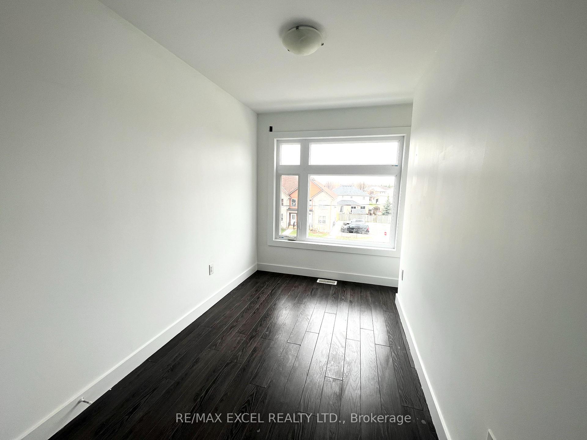Photo 5 of Unit 1, 540 Essa Road, Barrie, Holly — HOMEH