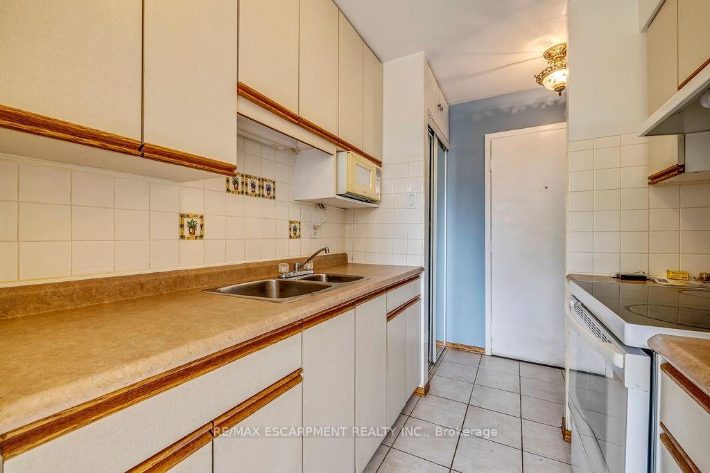 Photo 6 of Unit 202, 1950 Main Street W, Hamilton, Ainslie Wood — HOMEH