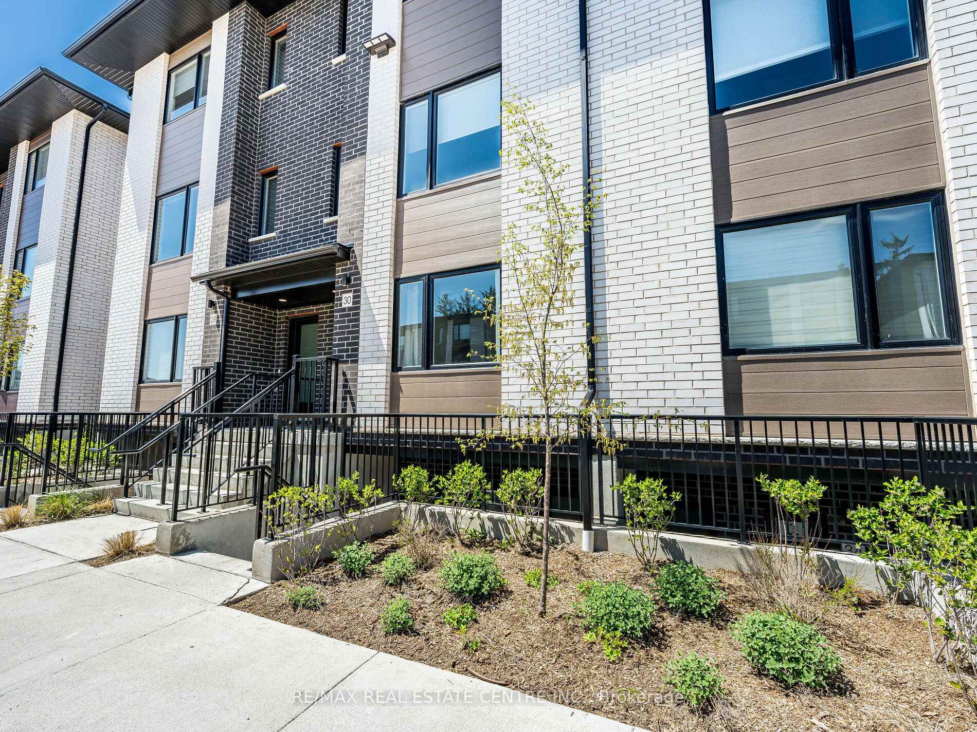 Photo 2 of 32 Lily Lane, Guelph, Clairfields/Hanlon Business Park — HOMEH