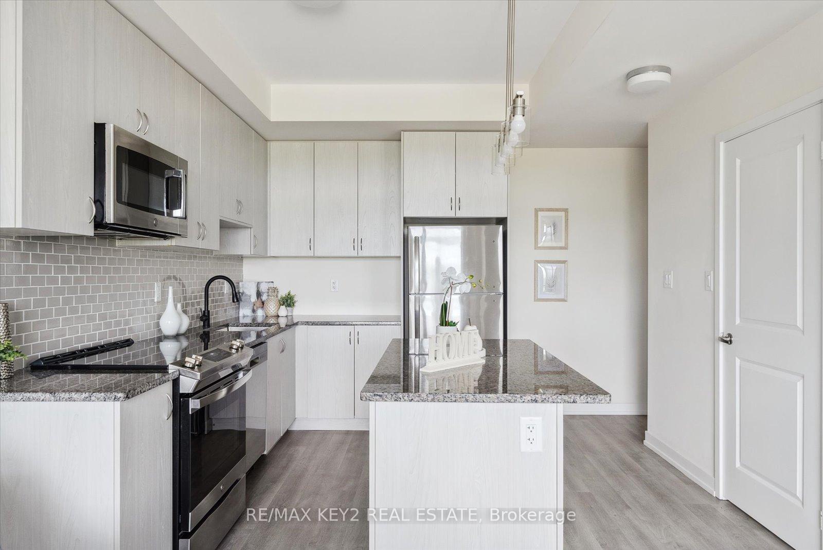 Photo 5 of Unit 313, 2550 Castlegate Crossing, Pickering, Duffin Heights — HOMEH