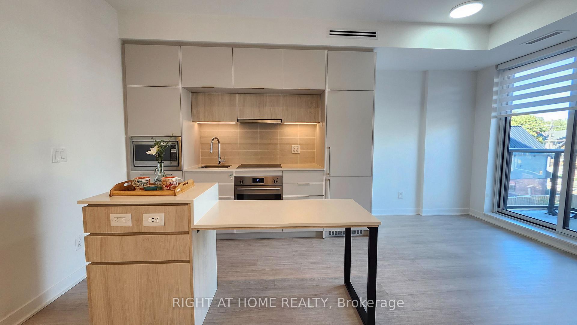 Photo 3 of Unit 406, 185 Alberta Avenue, Toronto, Oakwood Village — HOMEH