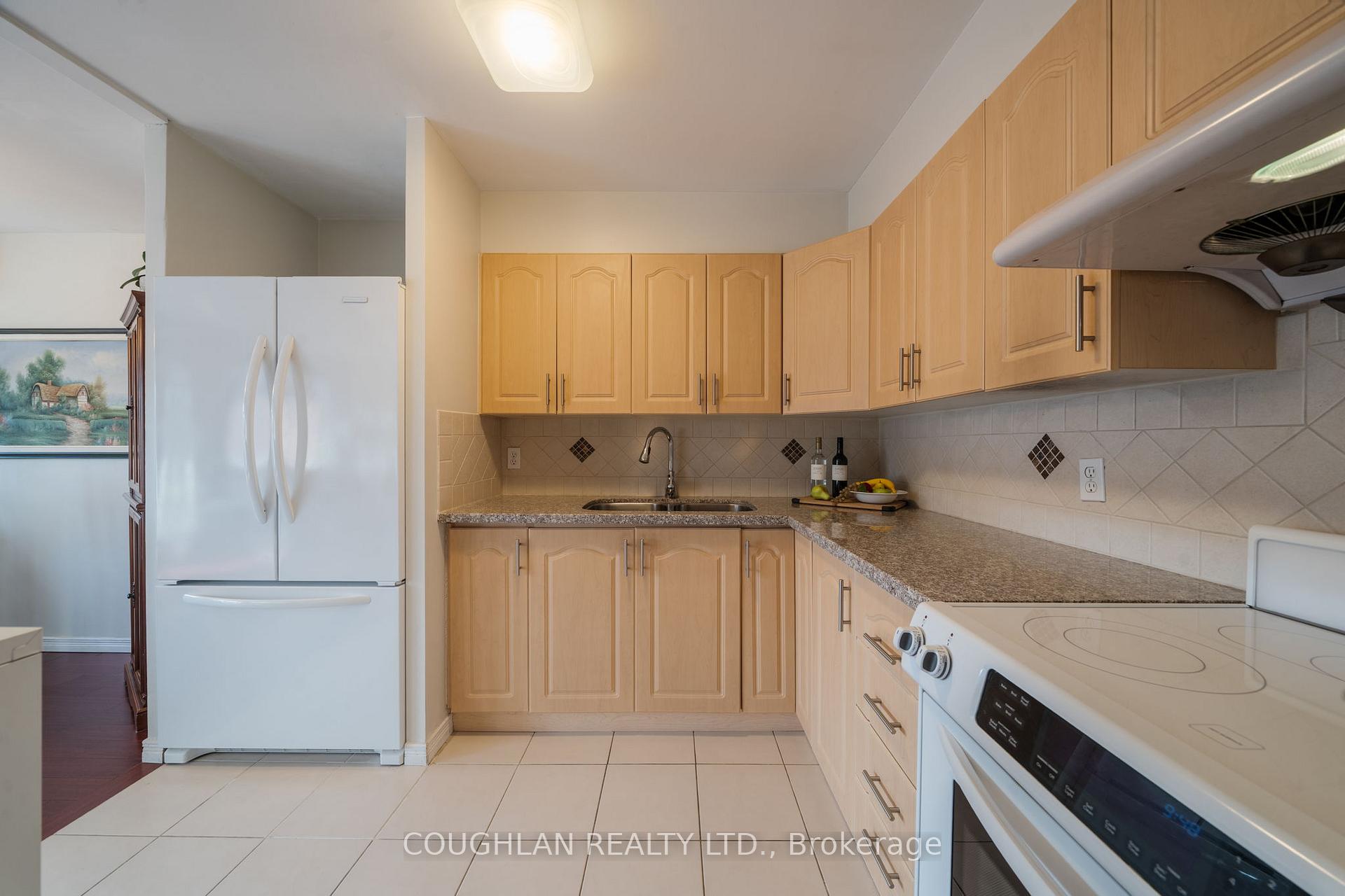 Photo 5 of Unit 407, 131 Taunton Road E, Oshawa, Centennial — HOMEH