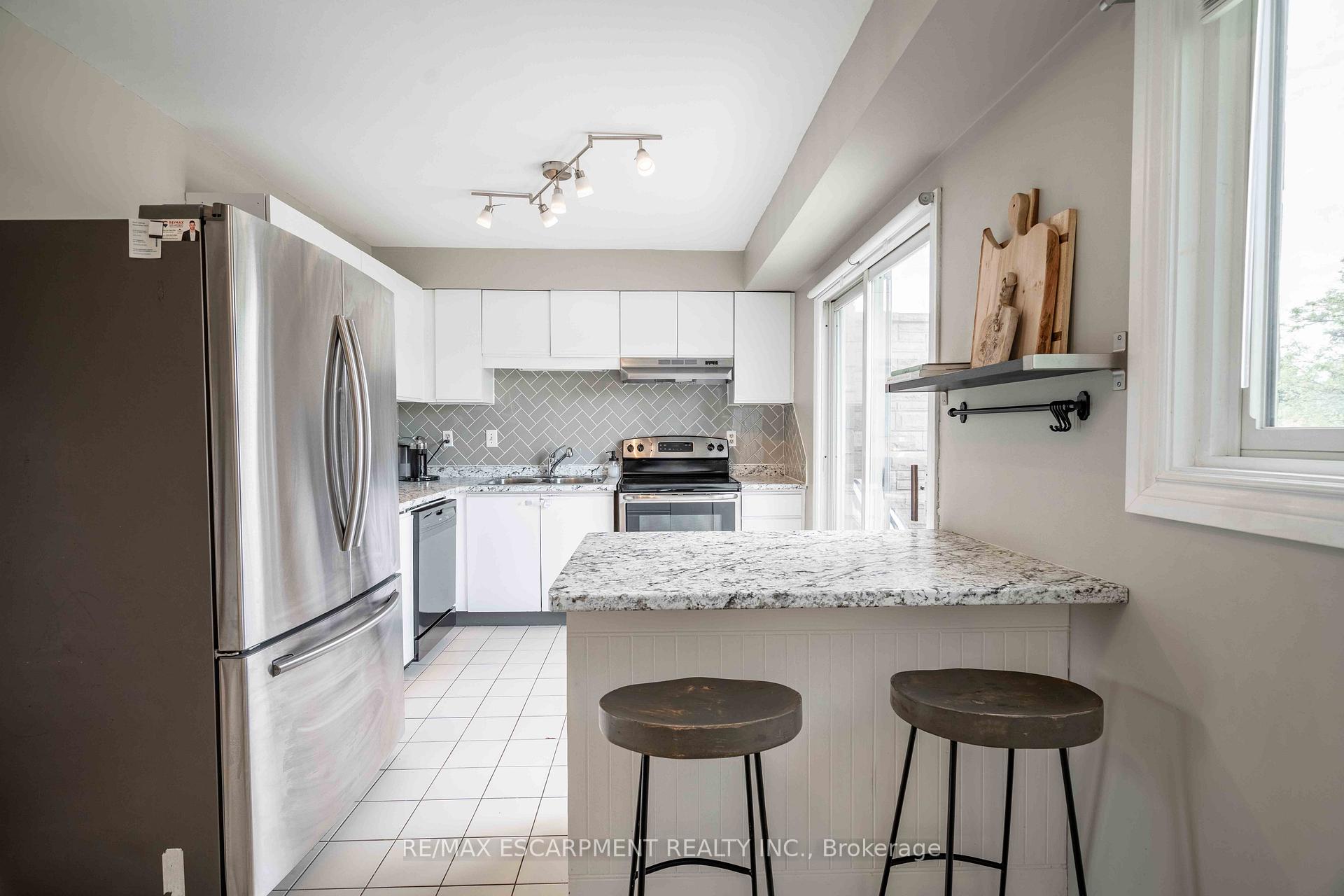 Photo 43 of Unit 13, 1155 Paramount Drive, Hamilton, Stoney Creek — HOMEH