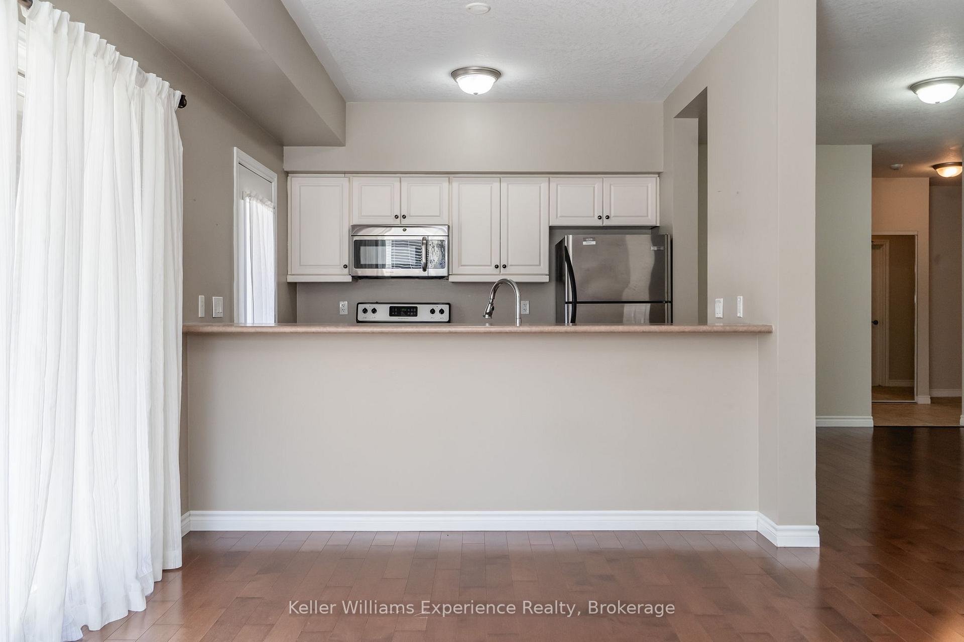 Photo 13 of Unit 101, 19B Yonge Street N, Springwater, Elmvale — HOMEH