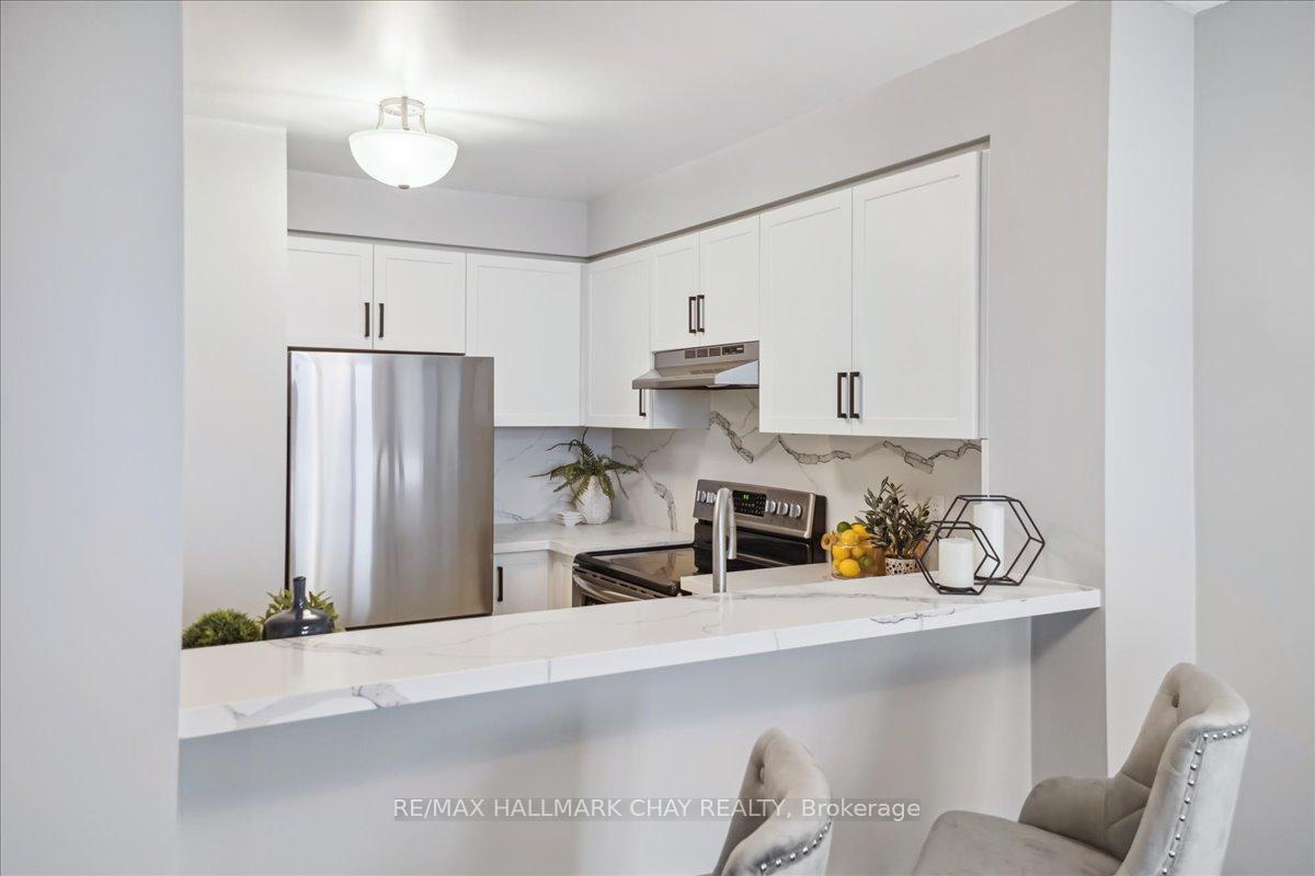 Photo 13 of Unit 805, 140 Dunlop Street E, Barrie, City Centre — HOMEH