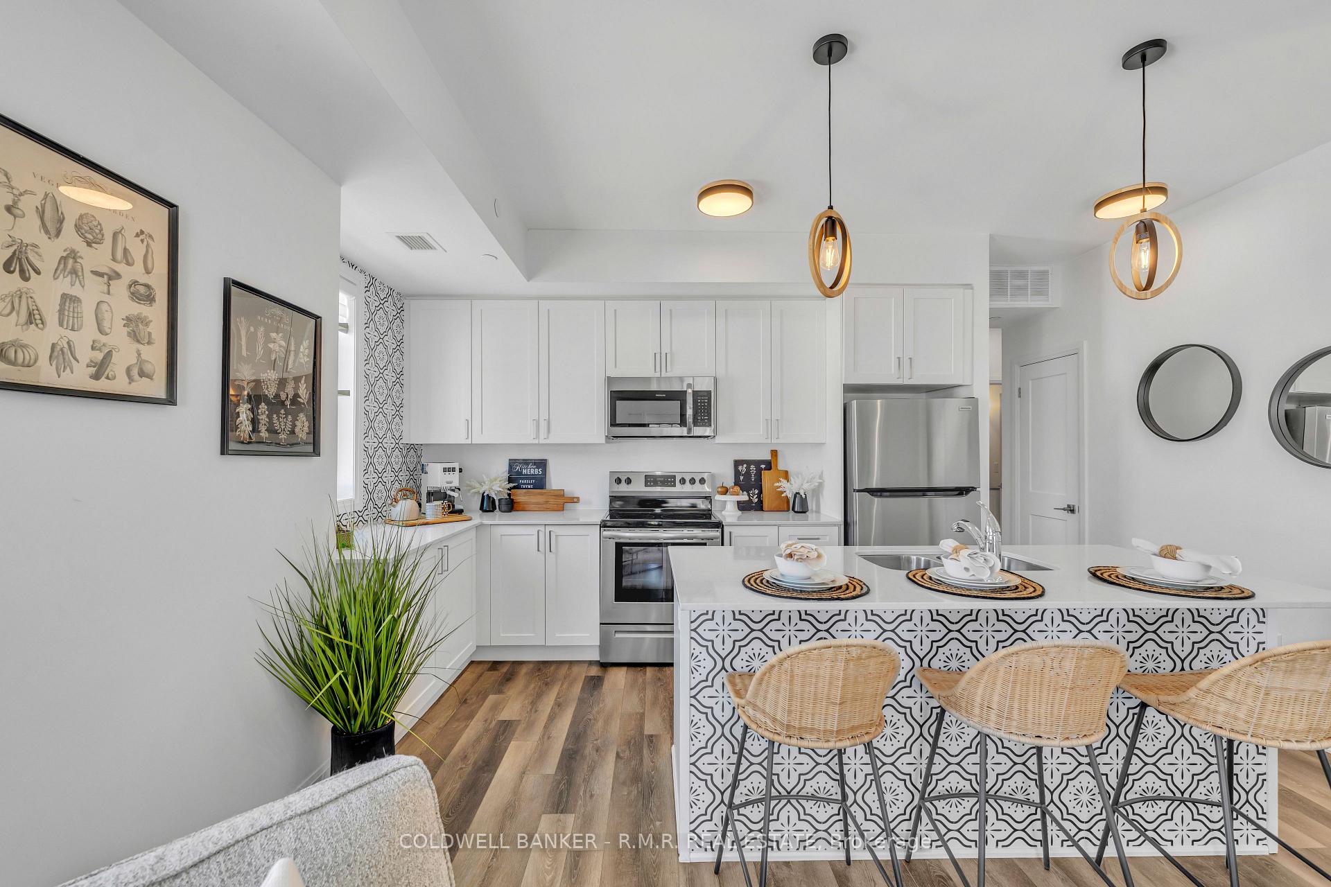 Photo 3 of Unit 417, 50 Lakebreeze Drive, Clarington, Newcastle — HOMEH