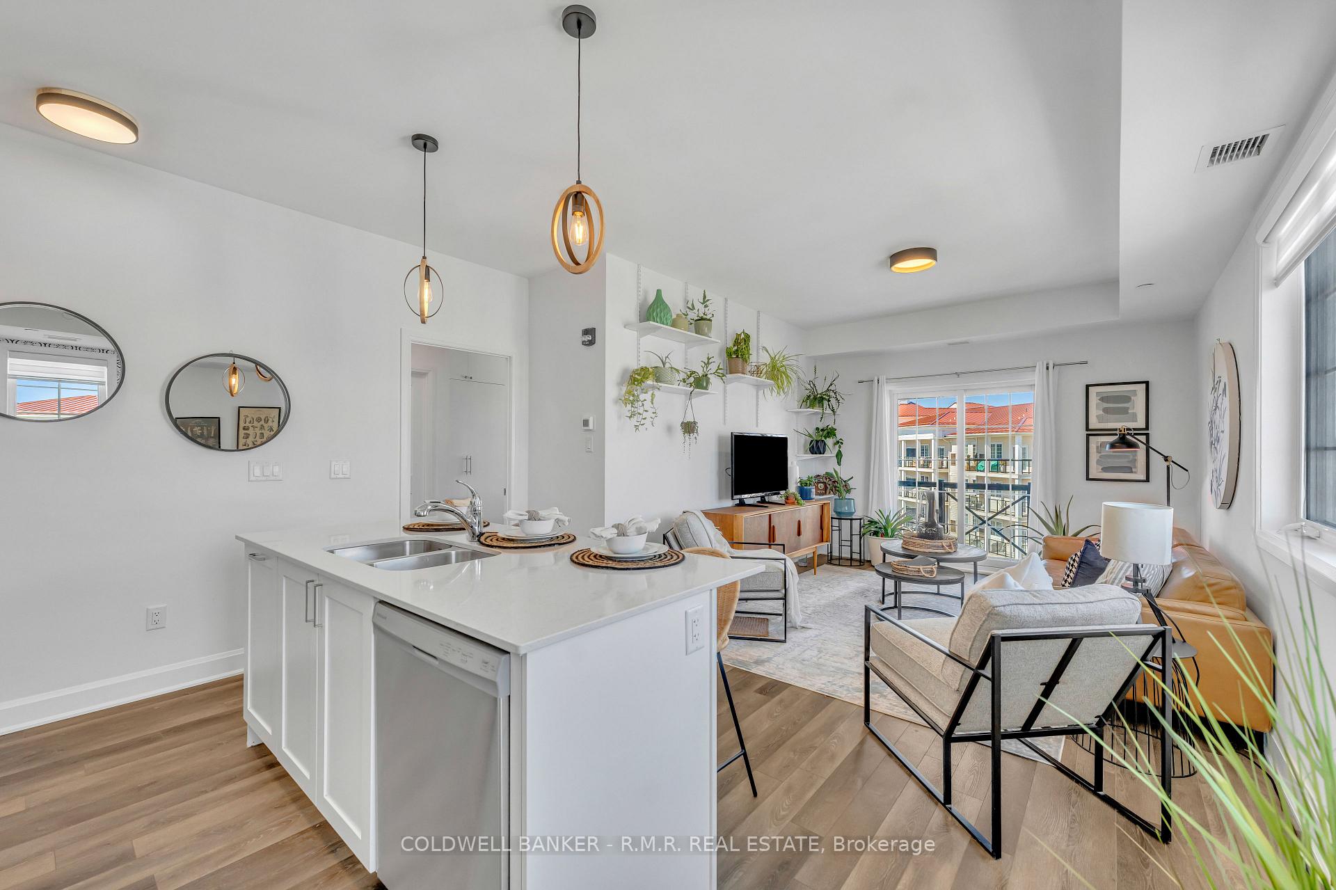 Photo 5 of Unit 417, 50 Lakebreeze Drive, Clarington, Newcastle — HOMEH