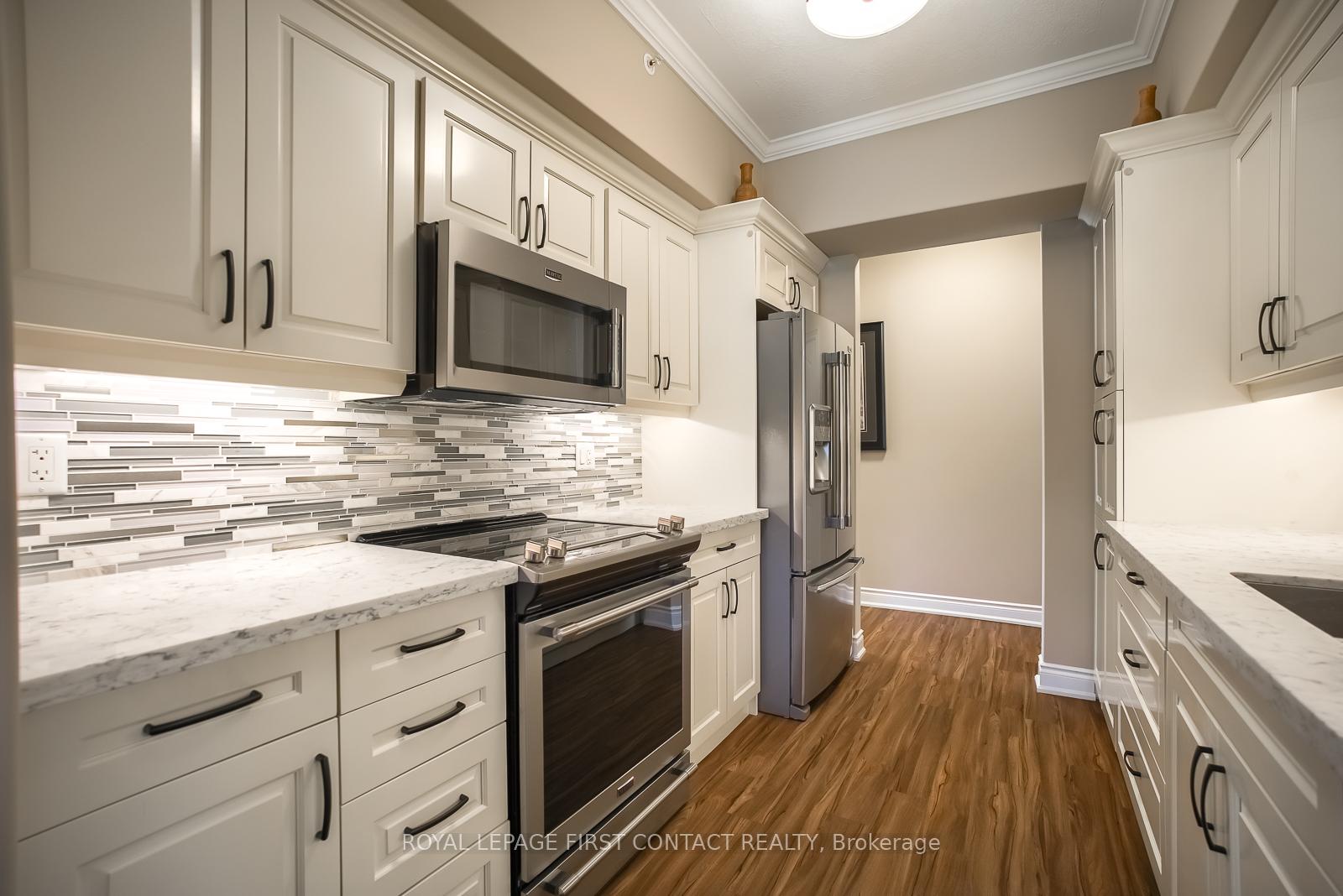 Photo 12 of Unit 101, 720 Yonge Street, Barrie, Painswick South — HOMEH