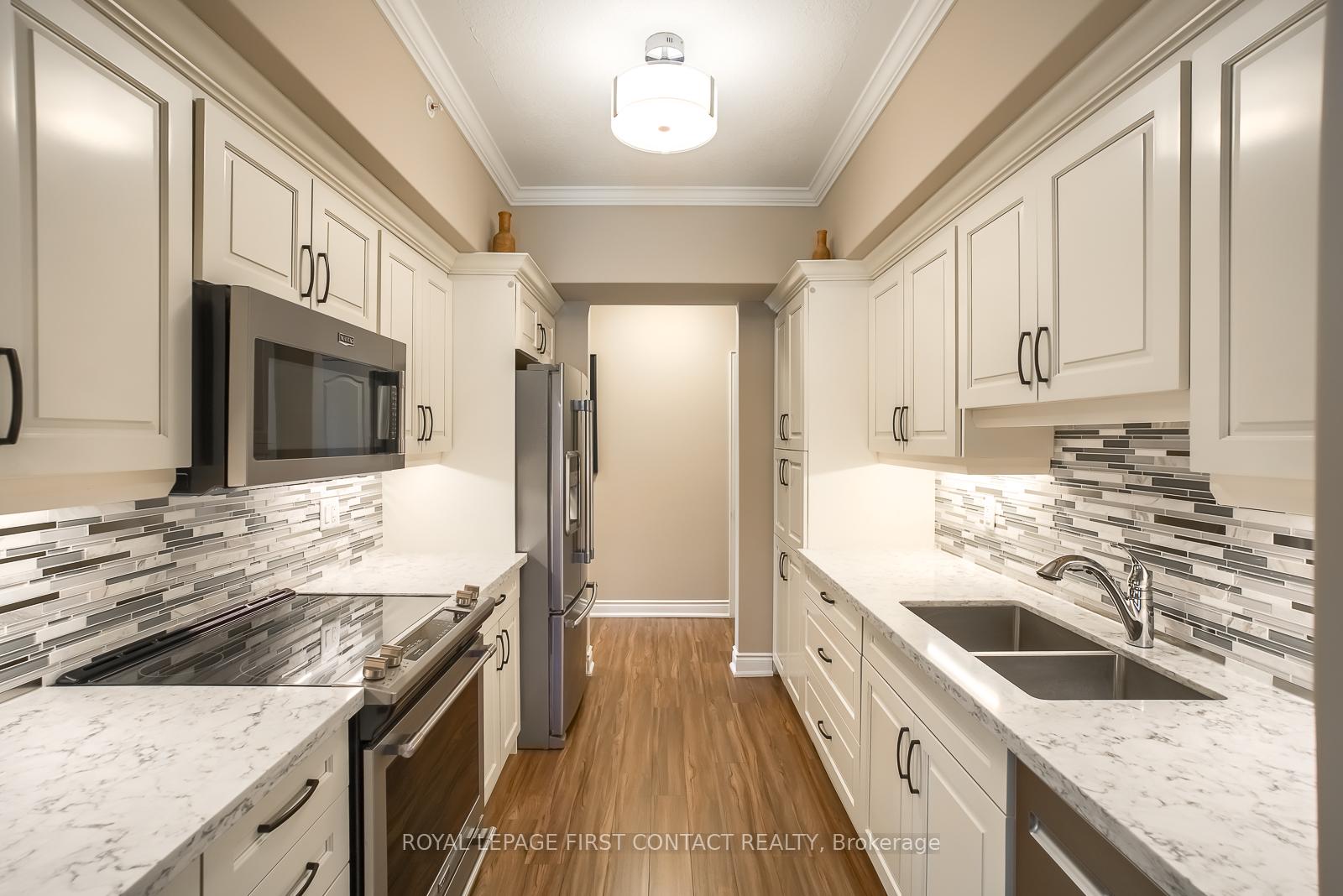 Photo 1 of Unit 101, 720 Yonge Street, Barrie, Painswick South — HOMEH