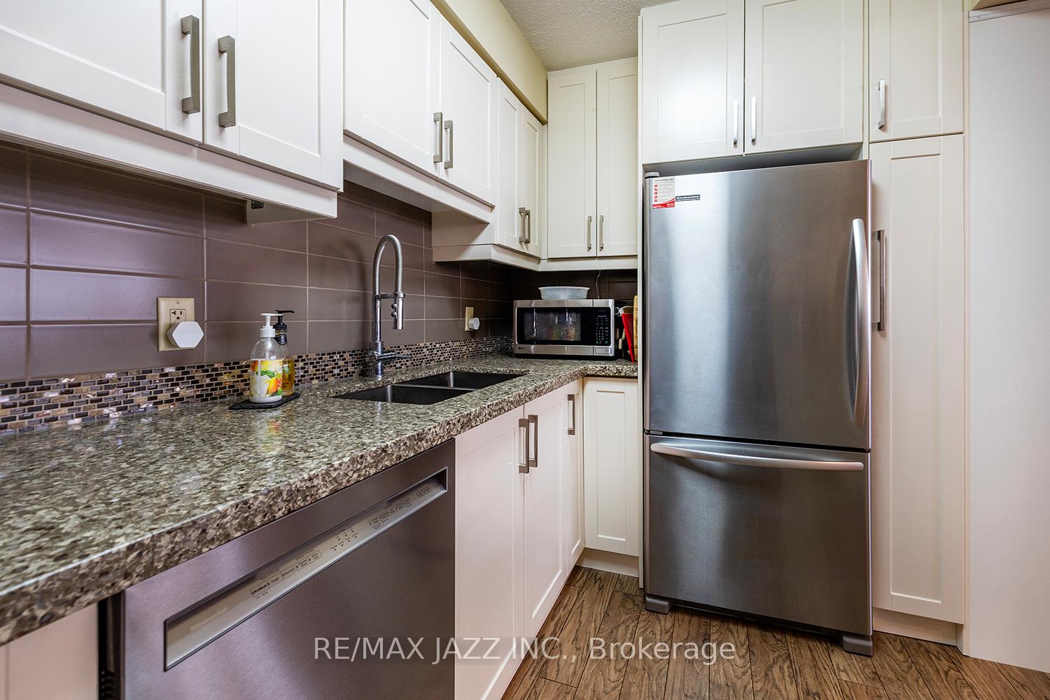Photo 21 of Unit 418, 50 Richmond Street E, Oshawa, O'Neill — HOMEH