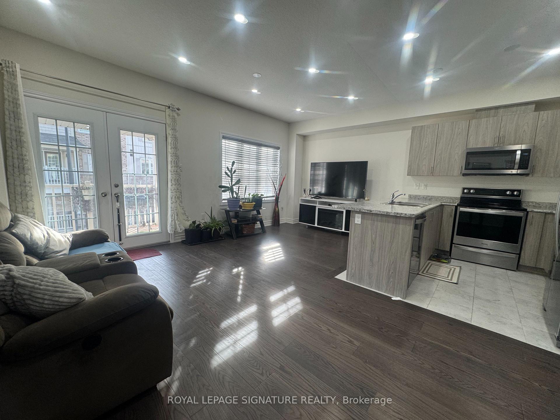 Photo 9 of Unit 13, 88 Decorso Drive, Guelph, Kortright East — HOMEH