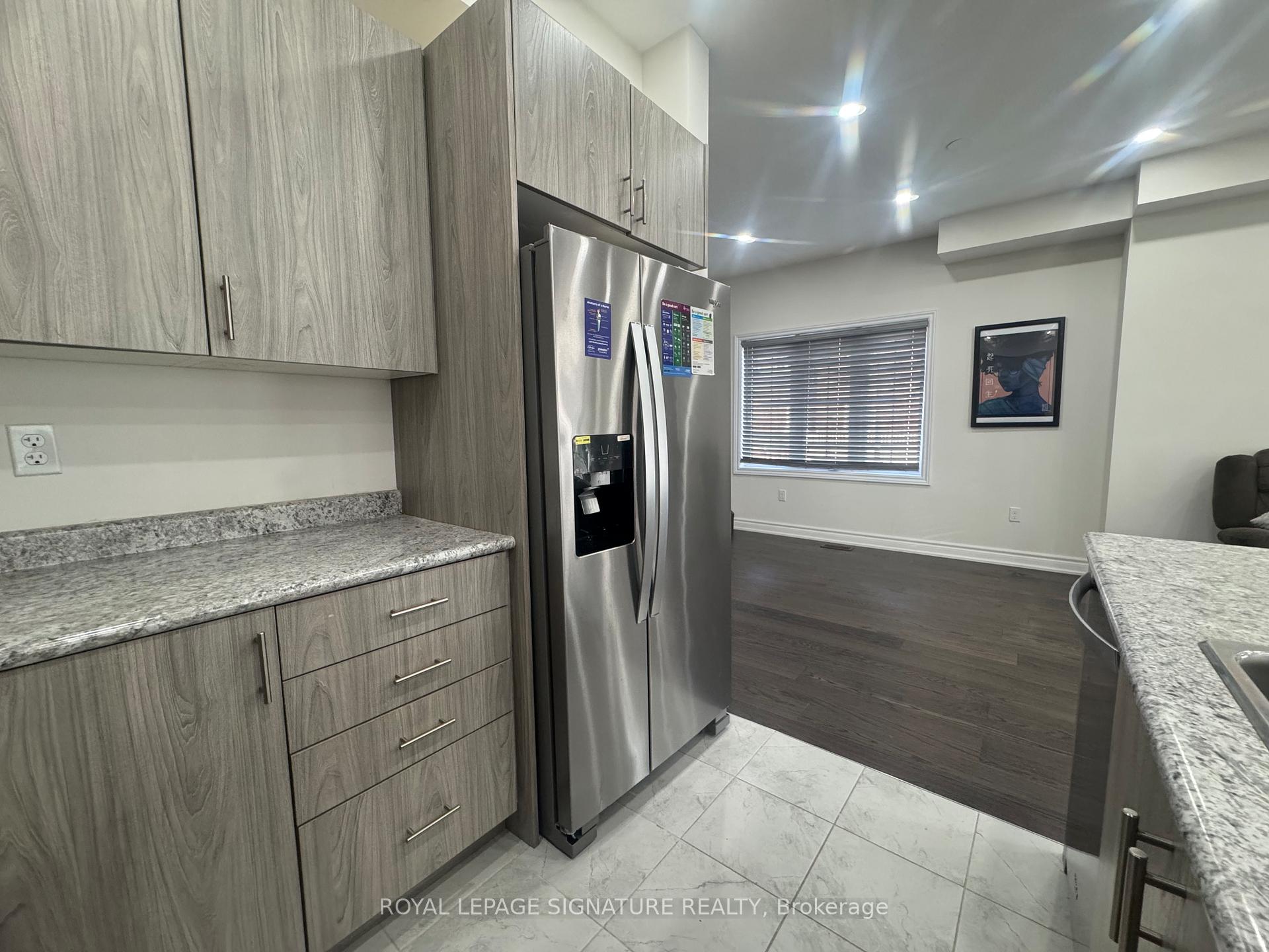 Photo 13 of Unit 13, 88 Decorso Drive, Guelph, Kortright East — HOMEH