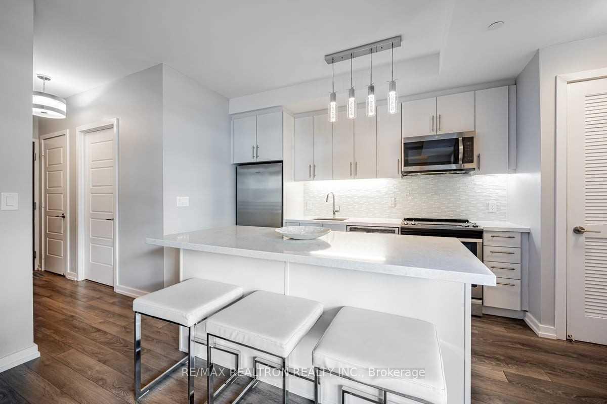 Photo 3 of Unit B203, 271 Sea Ray Avenue, Innisfil, Rural Innisfil — HOMEH