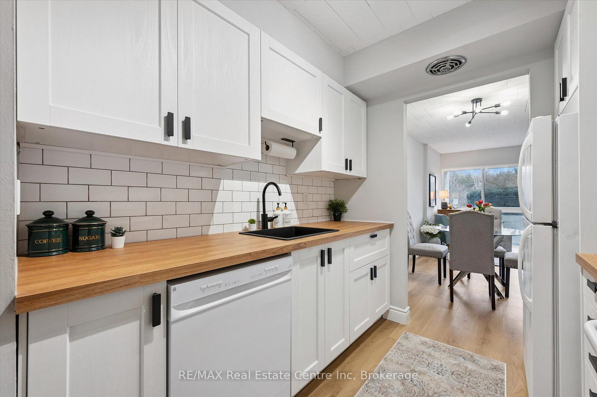 Photo 1 of Unit 102, 105 Conroy Crescent, Guelph, Dovercliffe Park/Old University — HOMEH