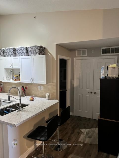 Photo 3 of Unit 406, 1370 Main Street E, Milton, Dempsey — HOMEH