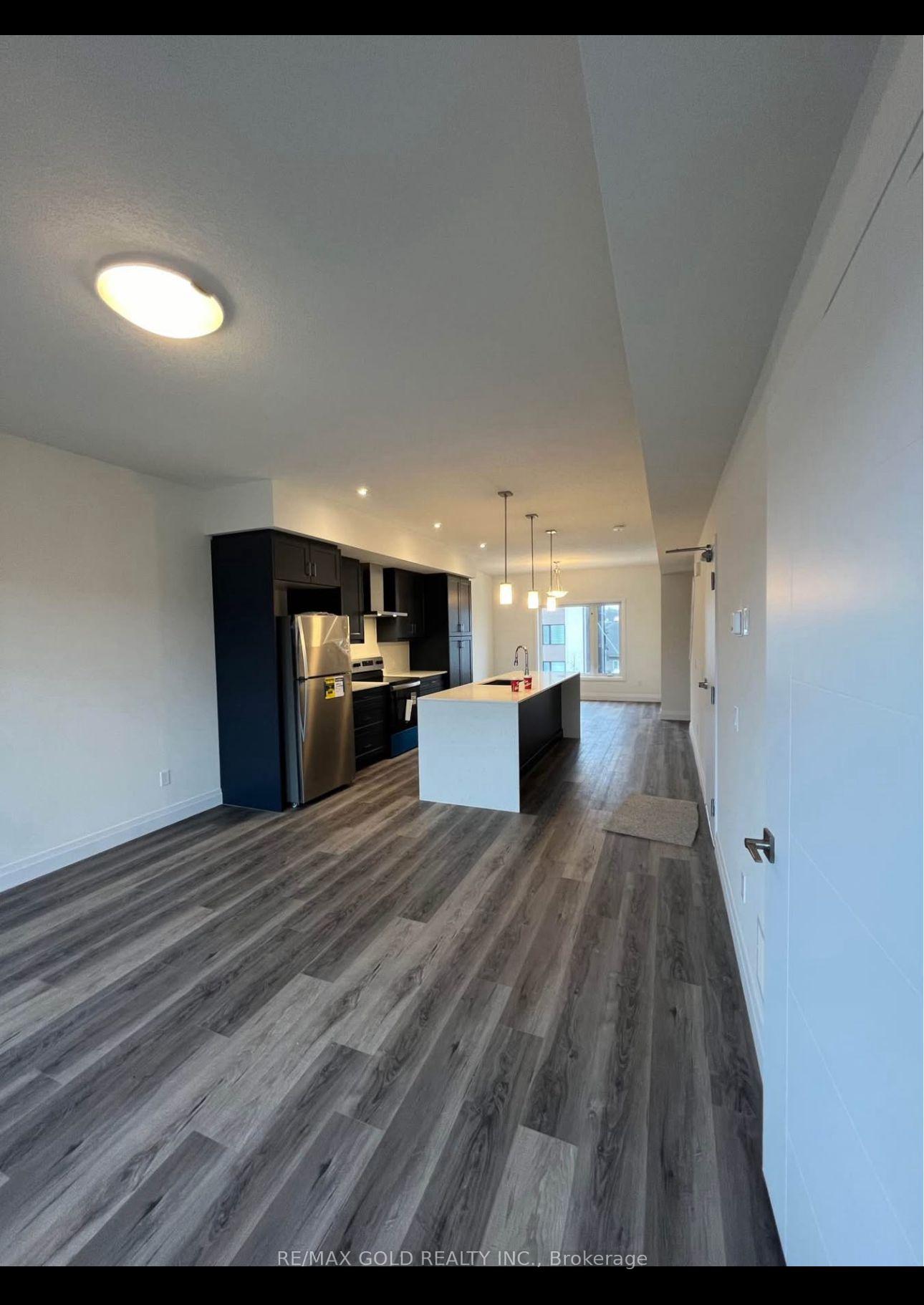 Photo 8 of 22 Lily Lane, Guelph, Clairfields/Hanlon Business Park — HOMEH