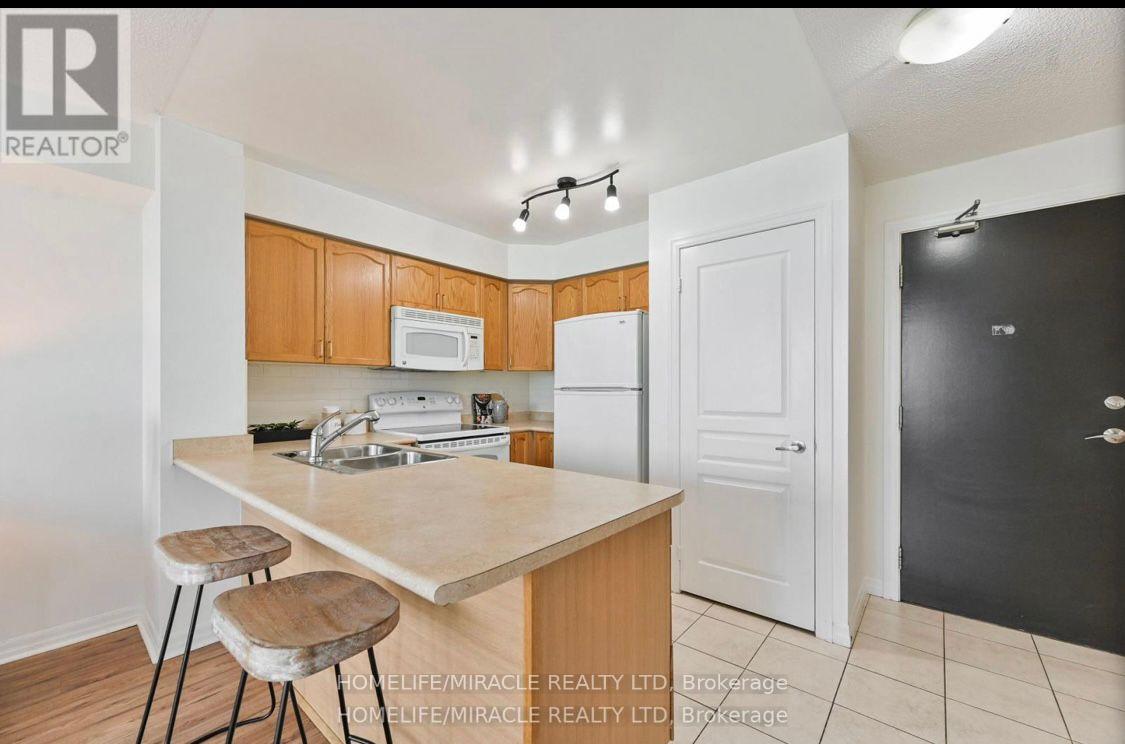 Photo 2 of Unit 409, 1600 Charles Street, Whitby, Port Whitby — HOMEH