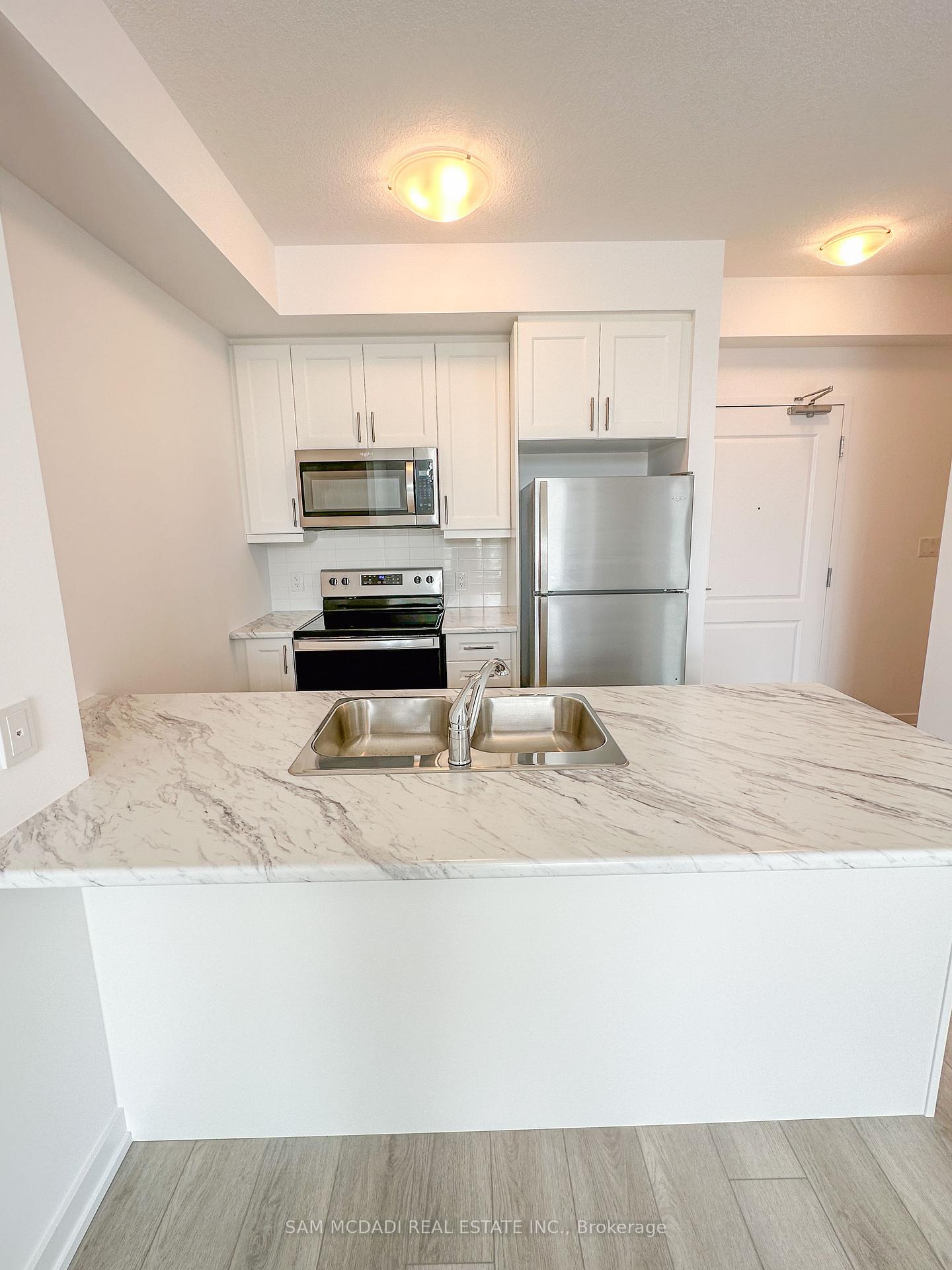 Photo 2 of Unit 213, 460 Dundas Street E, Hamilton, Waterdown — HOMEH