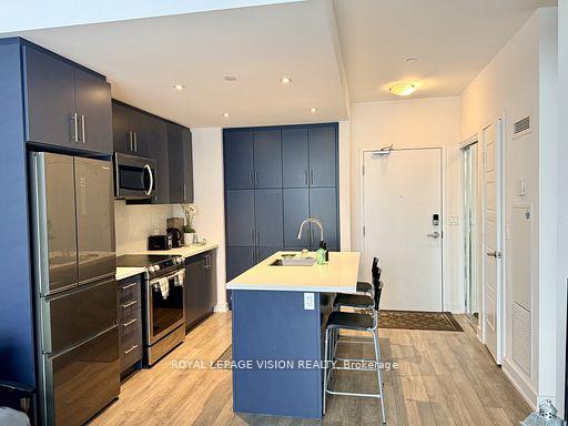 Photo 2 of Unit 407, 375 Sea Ray Avenue, Innisfil, Rural Innisfil — HOMEH