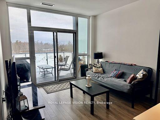 Photo 6 of Unit 407, 375 Sea Ray Avenue, Innisfil, Rural Innisfil — HOMEH