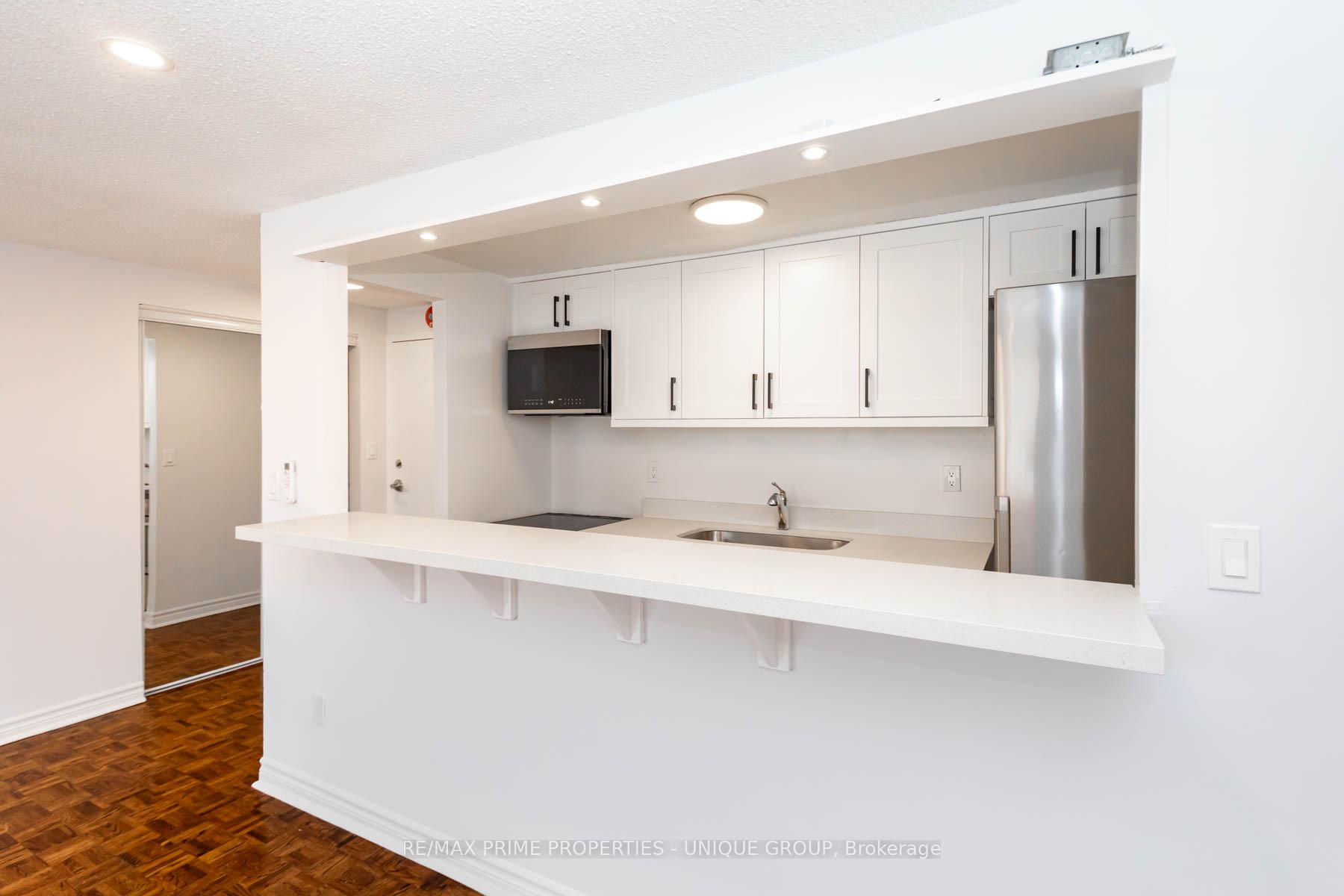 Photo 11 of Unit 402, 1962 Yonge Street, Toronto, Yonge-Eglinton — HOMEH