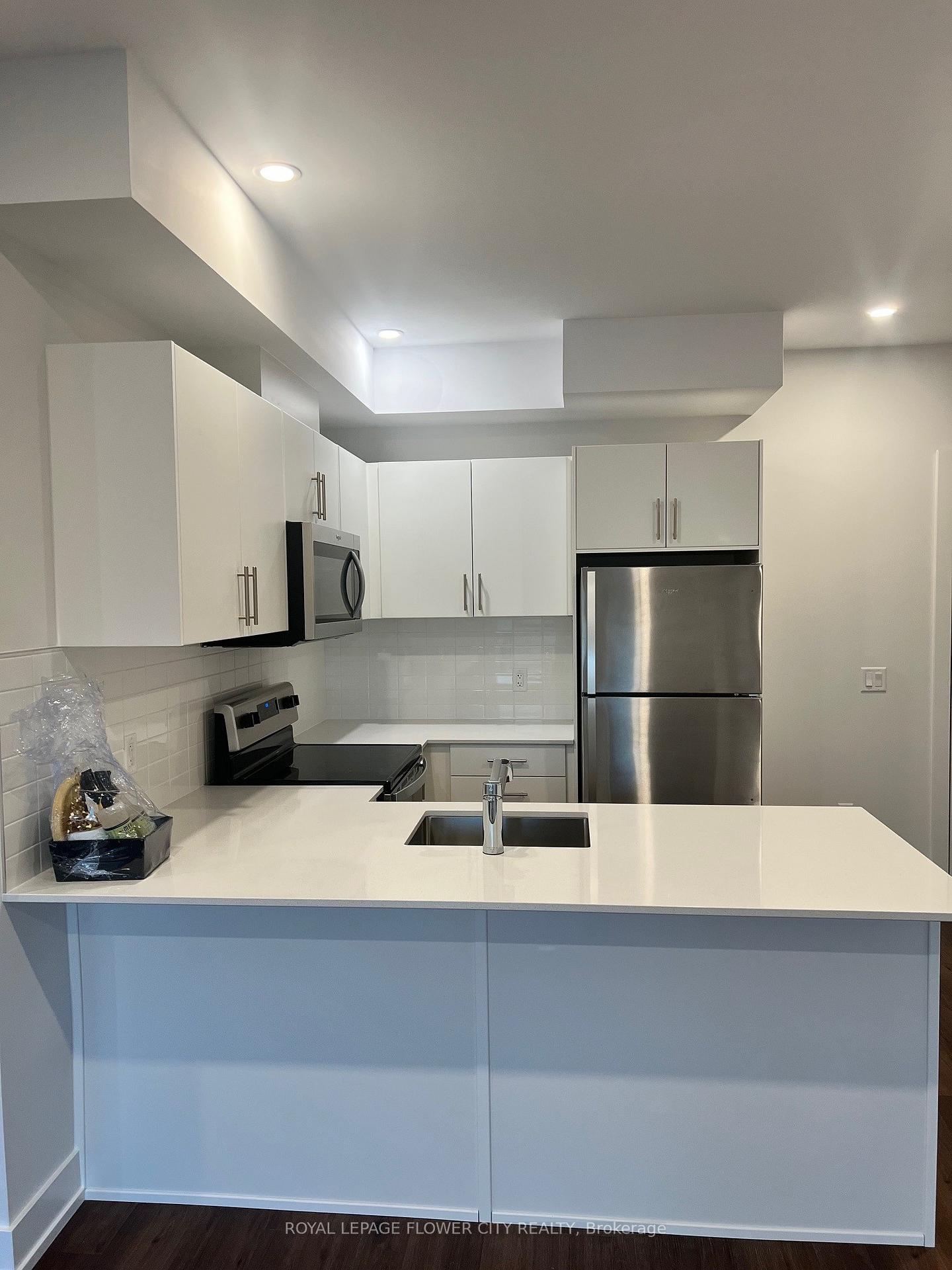 Photo 4 of Unit 103, 1000 Lackner Place, Kitchener — HOMEH