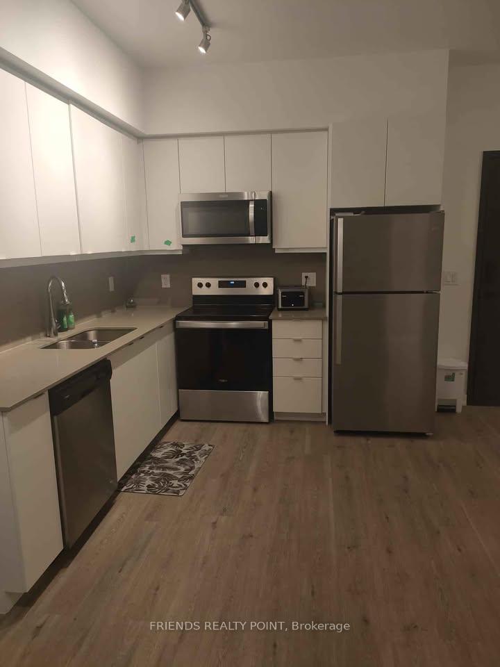 Photo 5 of Unit 104, 56 Lakeside Terrace, Barrie, Little Lake — HOMEH