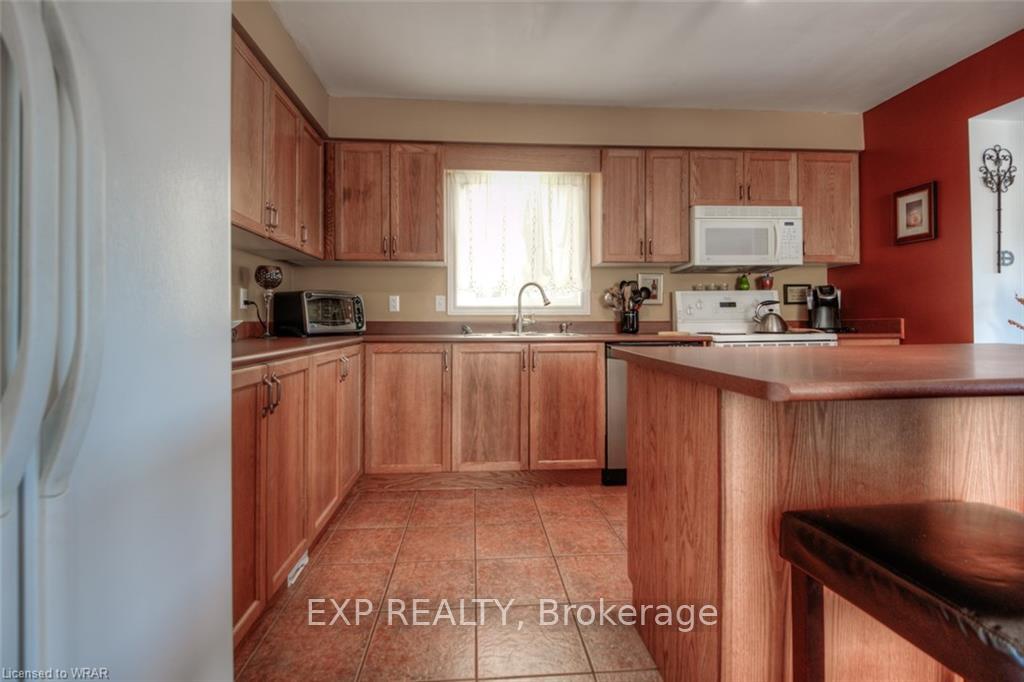 Photo 9 of Unit MAIN LEVEL, 89 Milson Crescent, Guelph, Kortright Hills — HOMEH